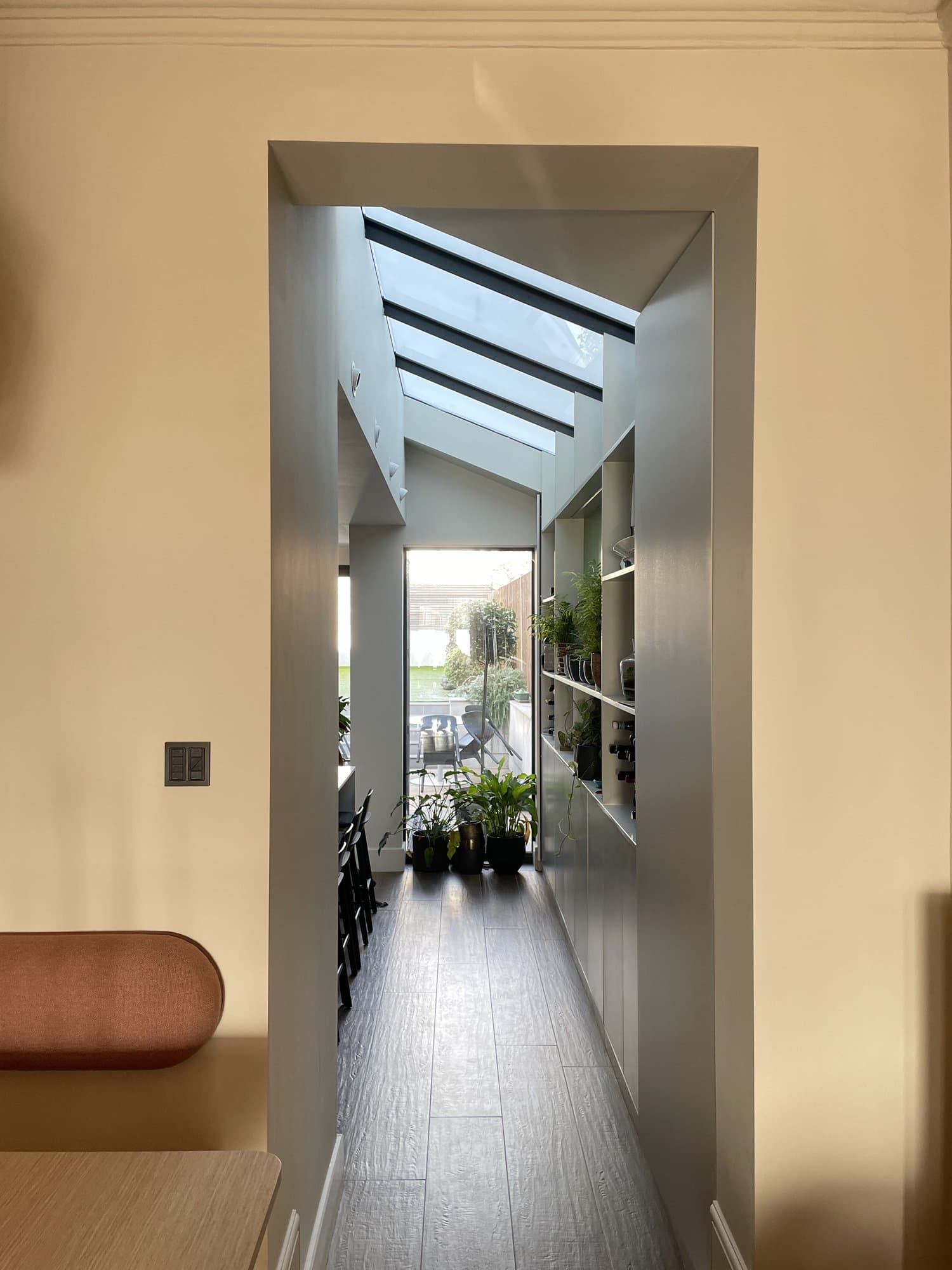 Fitness room corridor with skylight and garden view, luxury renovation, Haringey