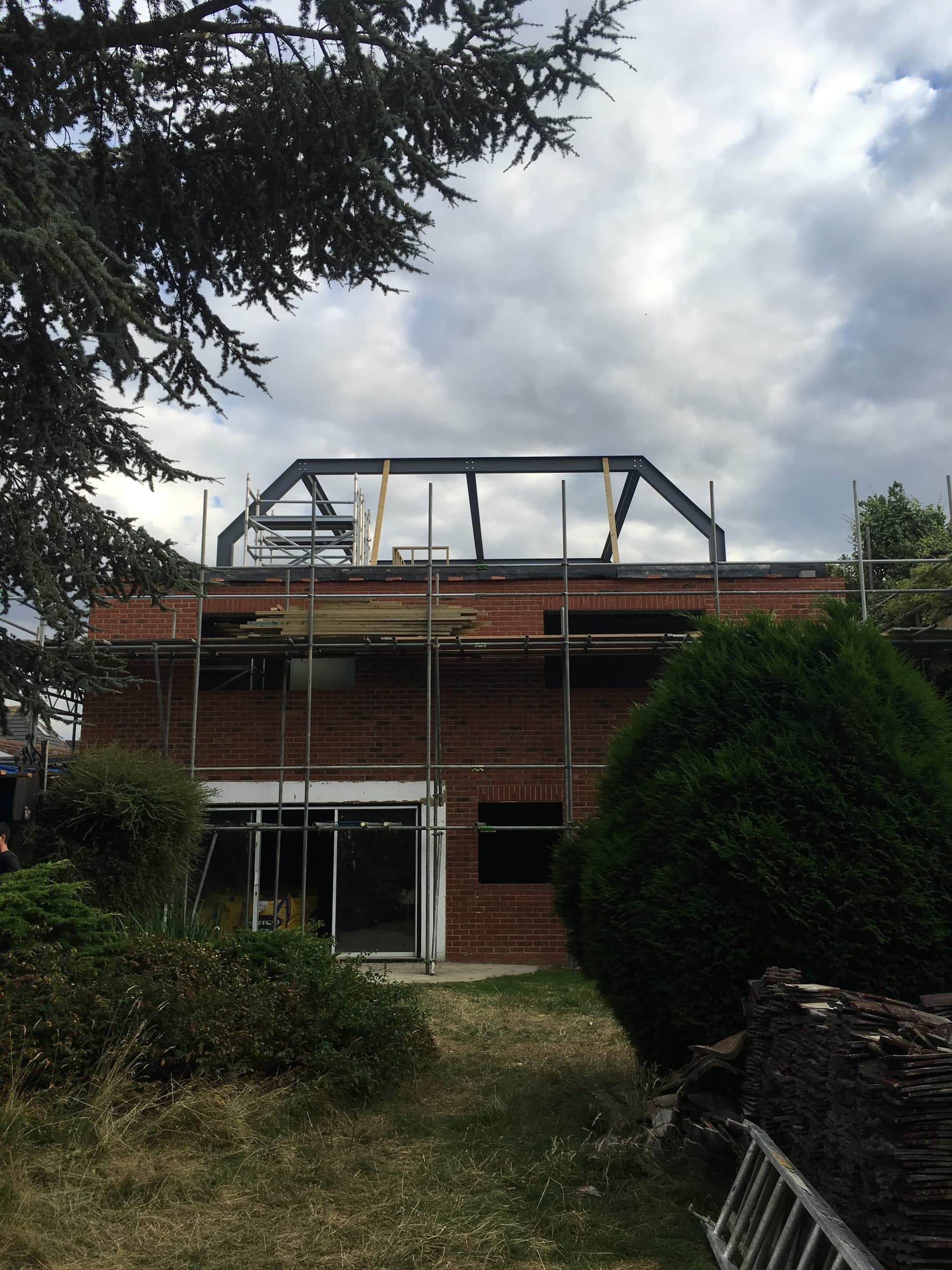 Steel canopy frame being erected during construction